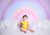 Baby birthday photography backdrop with rainbow